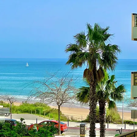 Prime Beachfront Location- Sea View, Large Balcony & Private Garage Портіман